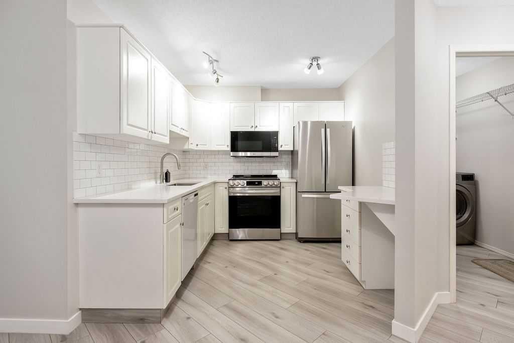 Photo of 20 Sierra Morena Mews SW #109, Calgary, AB T3H 3K6 (MLS # A2349542)