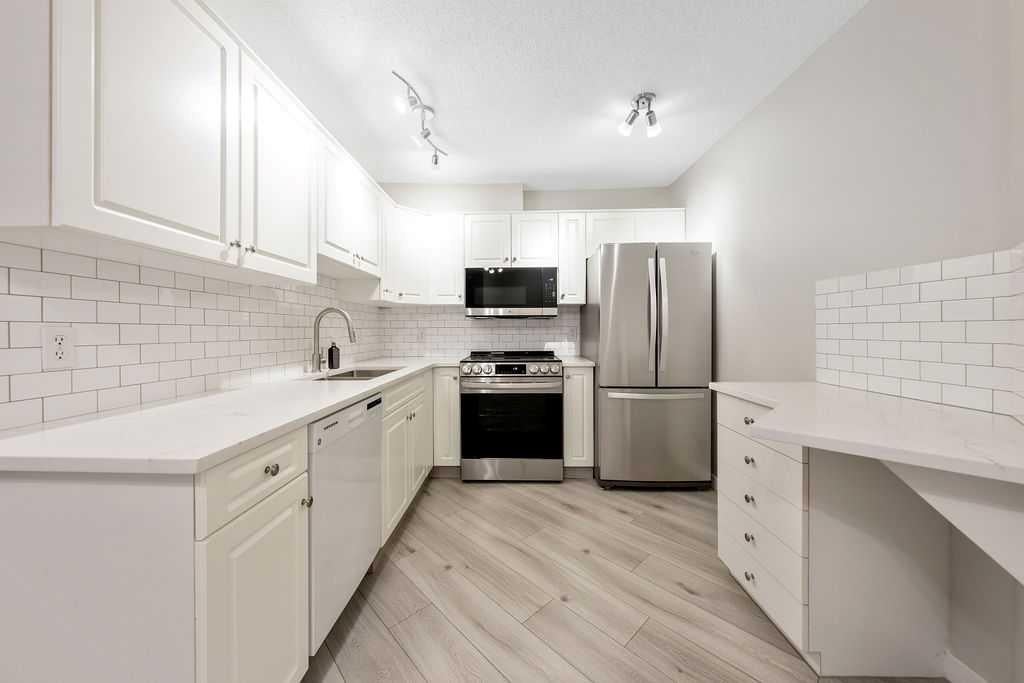 Photo of 20 Sierra Morena Mews SW #109, Calgary, AB T3H 3K6 (MLS # A2349542)
