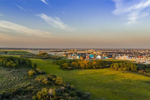 Photo of 80 Creekside Path SW, Calgary, AB T2X 0G7 (MLS # A2257842)