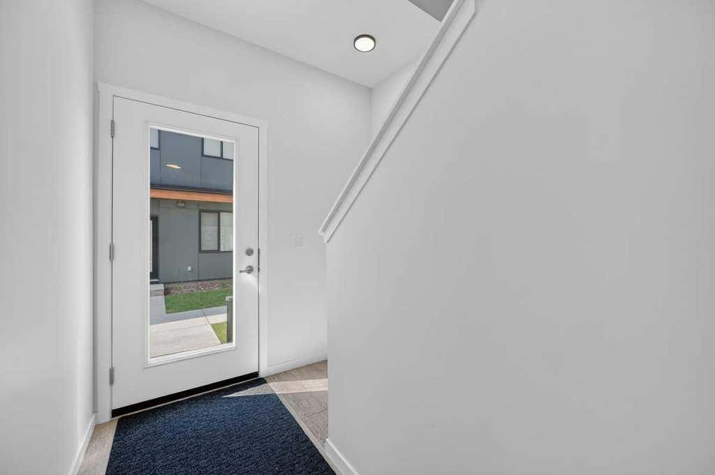 Photo of 81 MIDTOWN Boulevard SW #405, Airdrie, AB T4B 4E7 (MLS # A2328656)