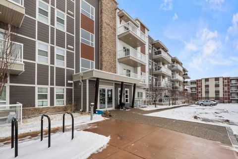 Photo of 360 Harvest Hills Common NE #107, Calgary, AB T3K 2N1 (MLS # A2289660)