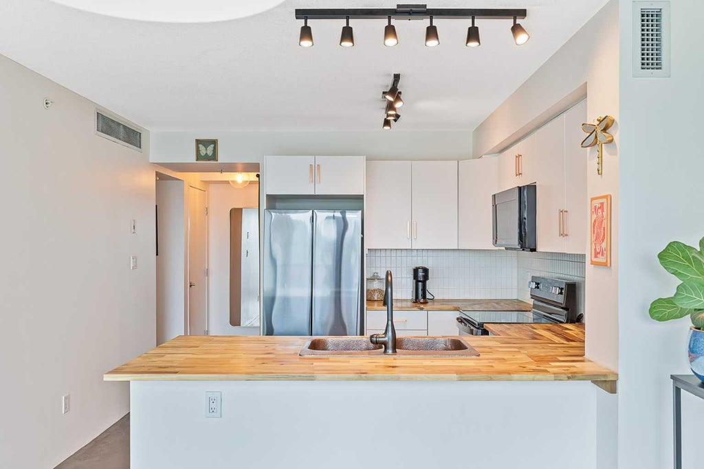 Photo of 188 15 Avenue SW #407, Calgary, AB T2R 1S4 (MLS # A2324747)