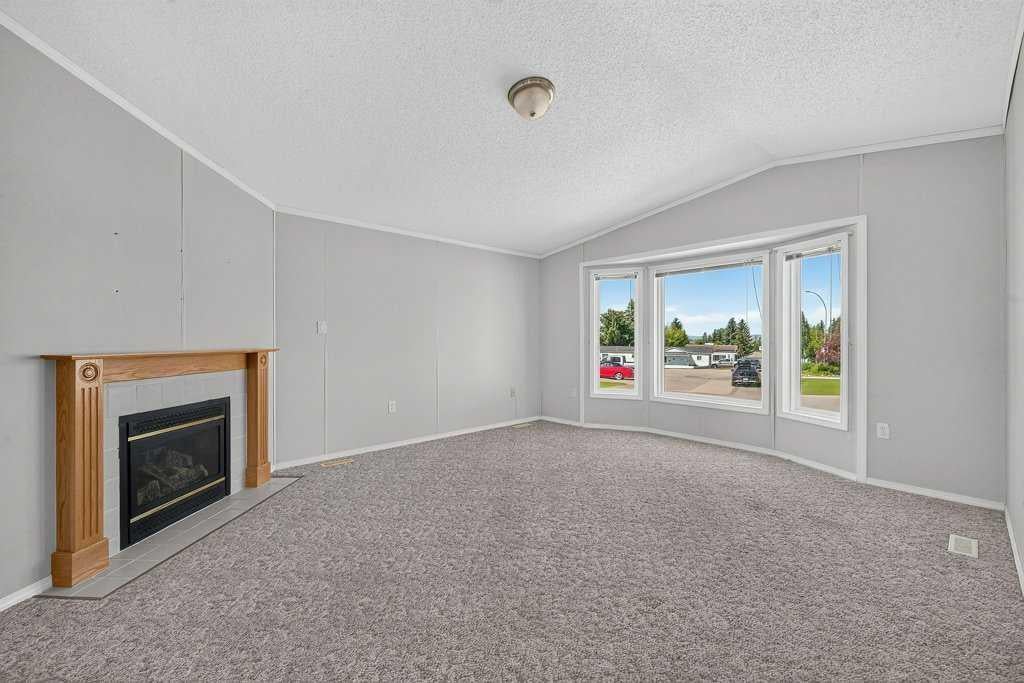 Photo of 206 2 Avenue SE, Diamond Valley, AB T0L 0H0 (MLS # A2327933)
