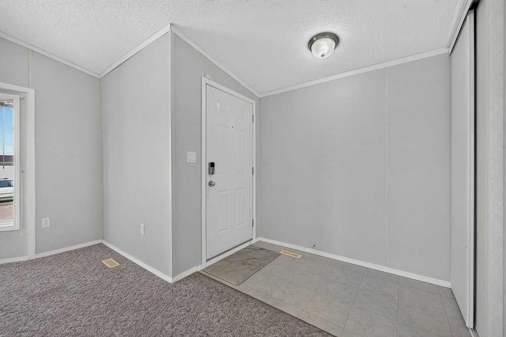 Photo of 206 2 Avenue SE, Diamond Valley, AB T0L 0H0 (MLS # A2327933)