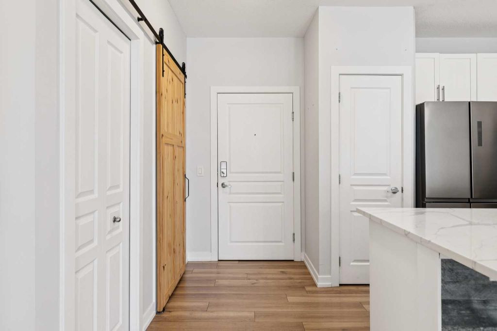 Photo of 10 Panatella Road NW #112, Calgary, AB T3K 0V4 (MLS # A2304815)