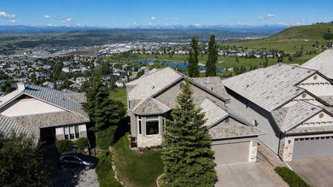 Photo of 124 Gleneagles Estates Lane, Cochrane, AB T4C 2H7 (MLS # A2324250)