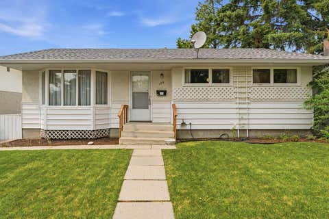 Photo of 120 Glenpatrick Drive SW, Calgary, AB T3E 4L6 (MLS # A2336892)