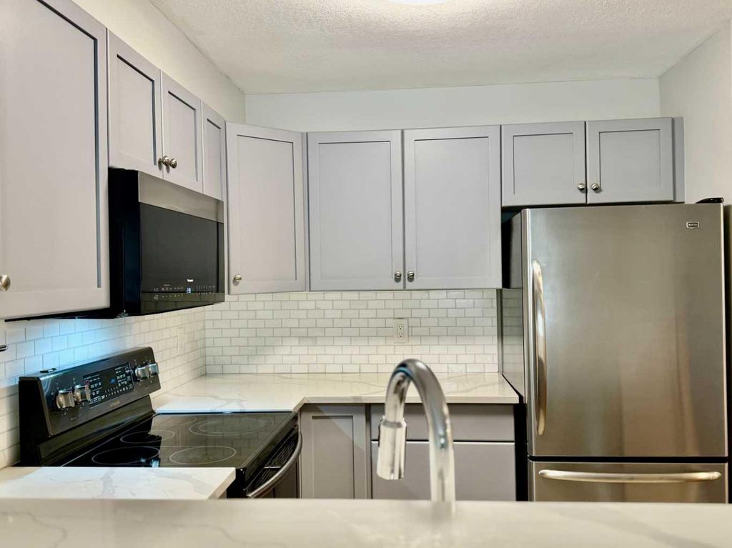 Photo of 2518 Fish Creek Boulevard SW #1212, Calgary, AB T2Y 4T5 (MLS # A2308736)