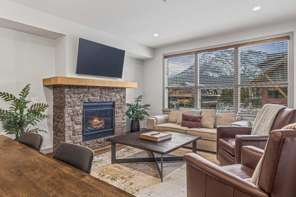 Photo of 1105 Spring Creek Drive Dr #302, Canmore, AB T1W 0M6 (MLS # A2316376)