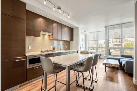 Photo of 222 Riverfront Avenue SW #451, Calgary, AB T2P 0X2 (MLS # A2261854)