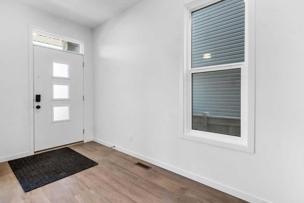 Photo of 317 Midgrove Link SW, Airdrie, AB T4B 5K9 (MLS # A2286729)