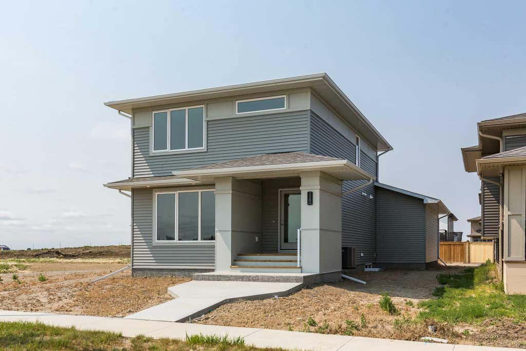 Photo of 320 Aquitania Boulevard W, Lethbridge, AB T1J 5T4 (MLS # A2336538)