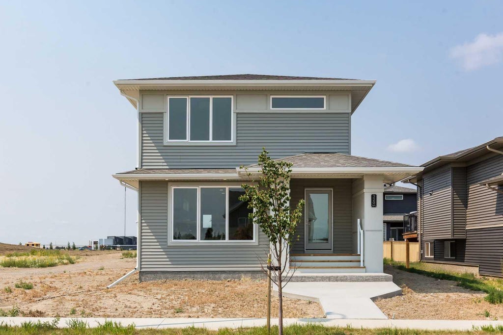 Photo of 320 Aquitania Boulevard W, Lethbridge, AB T1J 5T4 (MLS # A2336538)