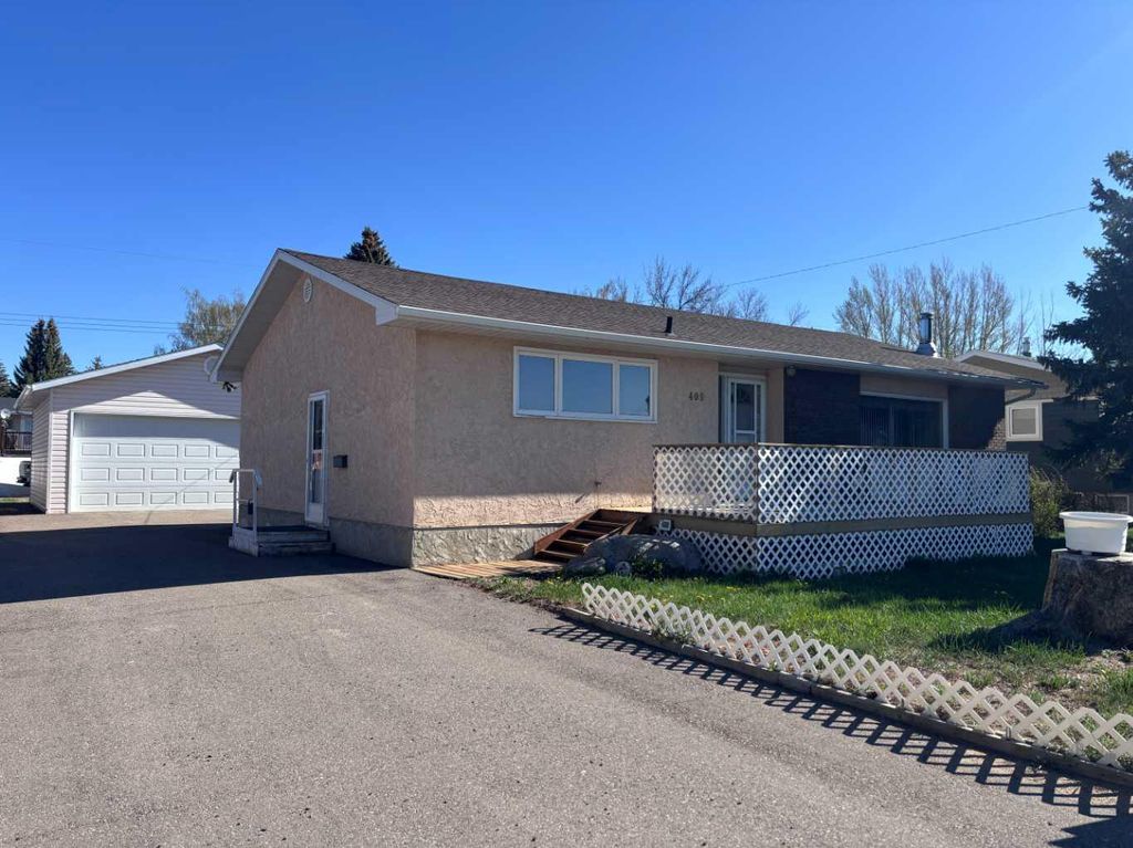 Photo of 409 Centre Avenue NE, Milk River, AB T0K 1M0 (MLS # A2309995)