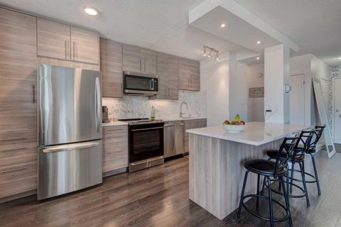Photo of 1027 Cameron Avenue SW #510, Calgary, AB T2T 0K3 (MLS # A2322282)