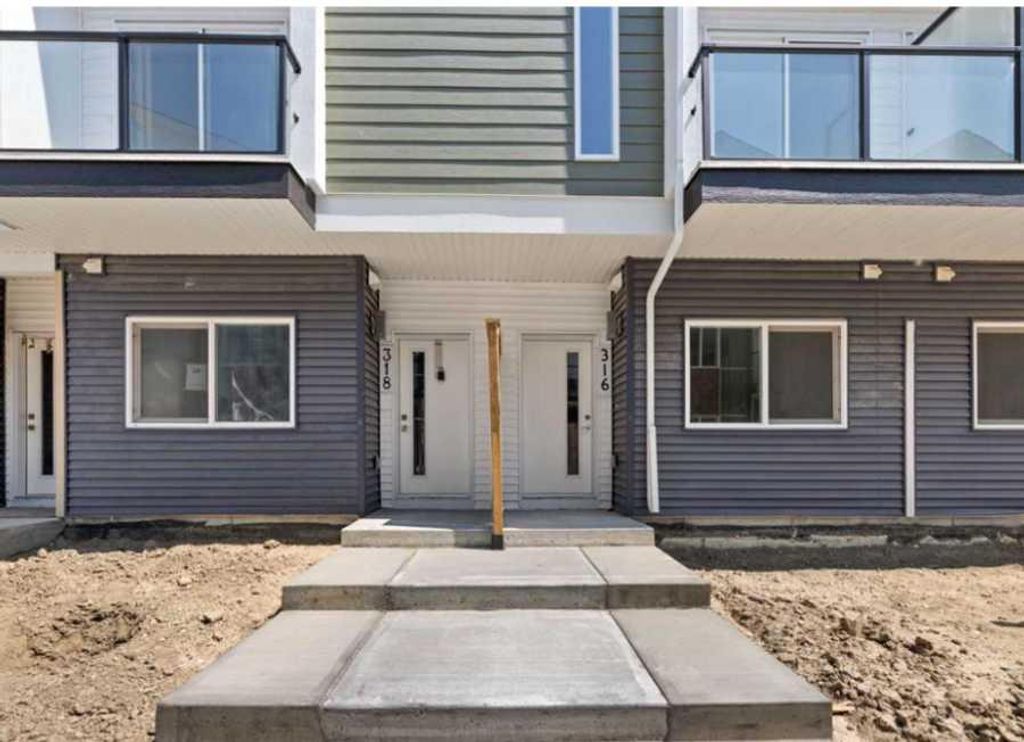 Photo of 52 Red Sky Villas NE #314, Calgary, AB T3N 1N3 (MLS # A2303122)