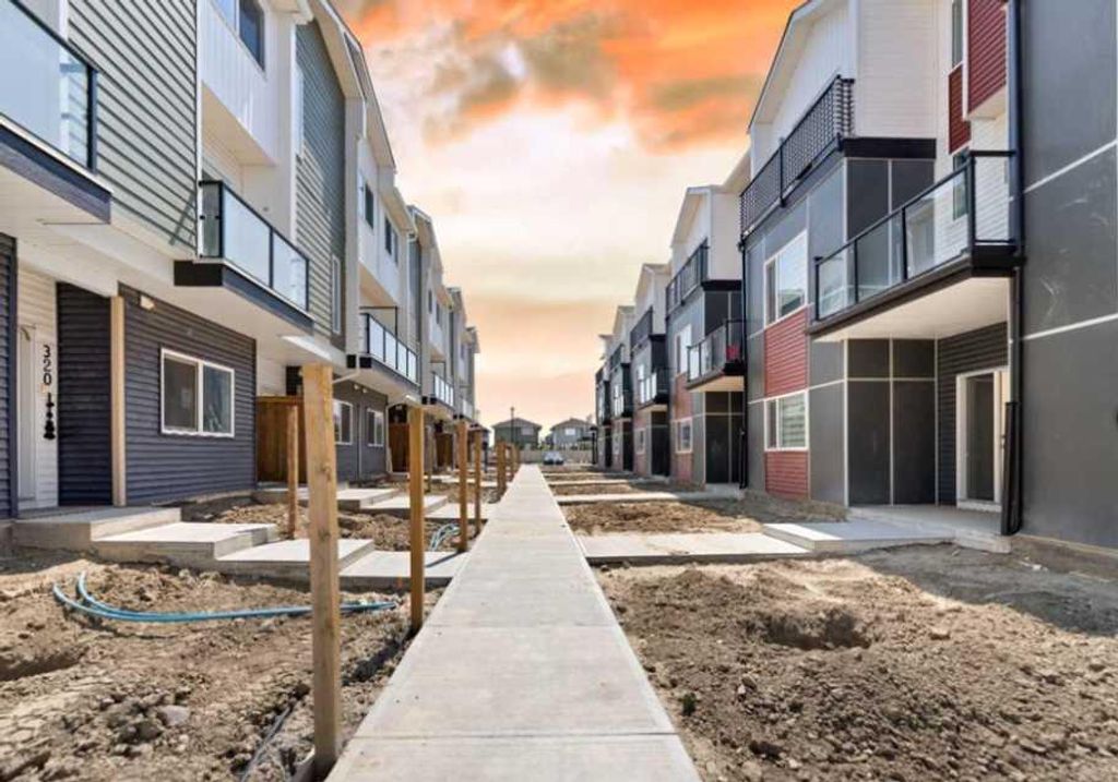Photo of 52 Red Sky Villas NE #314, Calgary, AB T3N 1N3 (MLS # A2303122)
