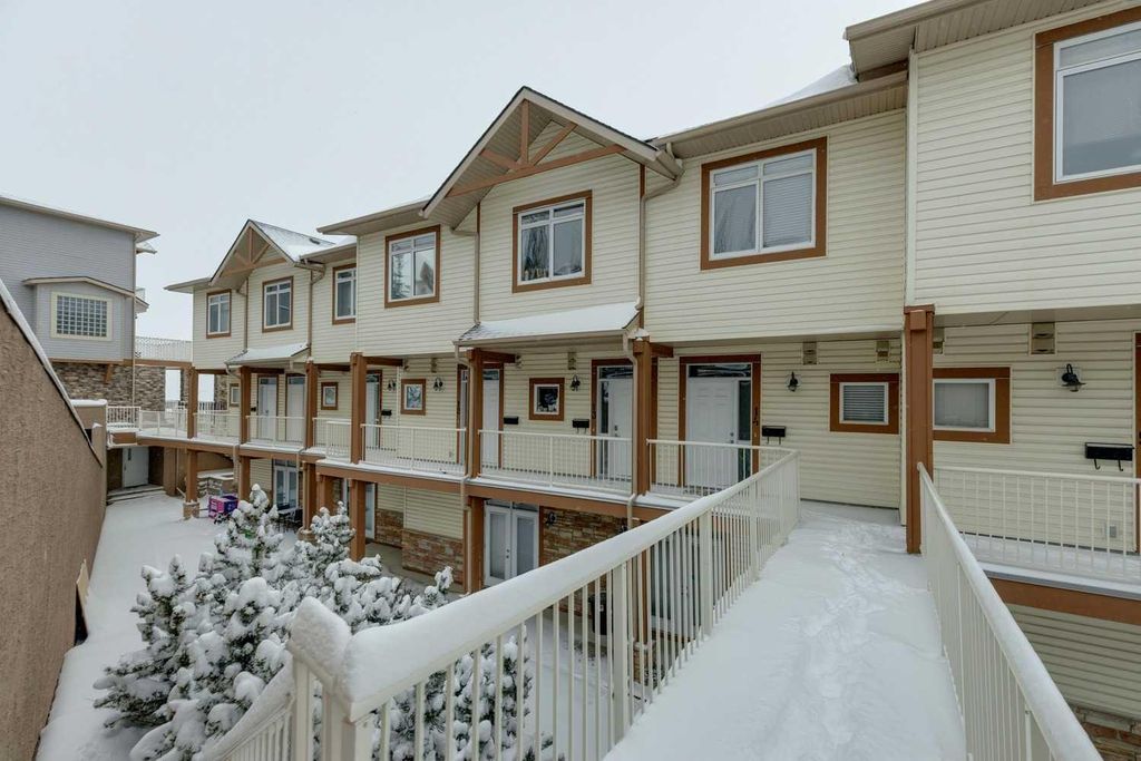 Photo of 133 Rockyledge View NW #14, Calgary, AB T3G 5X2 (MLS # A2302976)