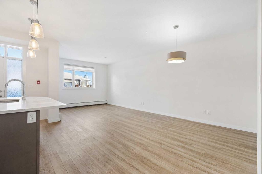 Photo of 30 Shawnee Common SW #12, Calgary, AB T2Y 0R1 (MLS # A2242372)