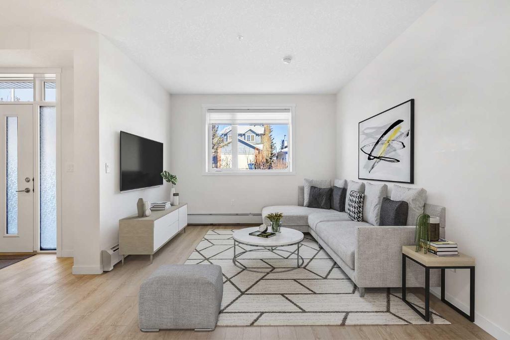 Photo of 30 Shawnee Common SW #12, Calgary, AB T2Y 0R1 (MLS # A2242372)