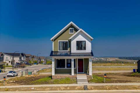 Photo of 87 Bluerock Terrace SW, Calgary, AB T2Y 0Y3 (MLS # A2322934)