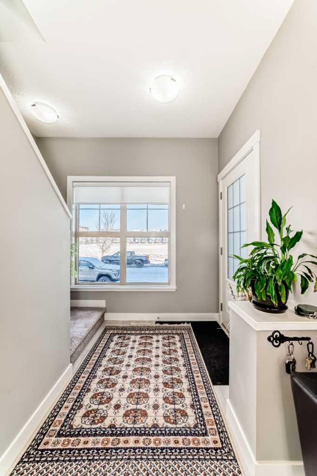 Photo of 32 Horseshoe Crescent #102, Cochrane, AB T4C 2P4 (MLS # A2283847)