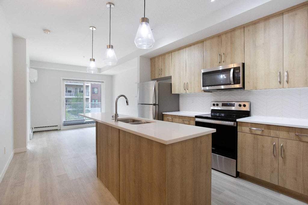 Photo of 71 Shawnee Common SW #206, Calgary, AB T2Y 0R2 (MLS # A2336282)