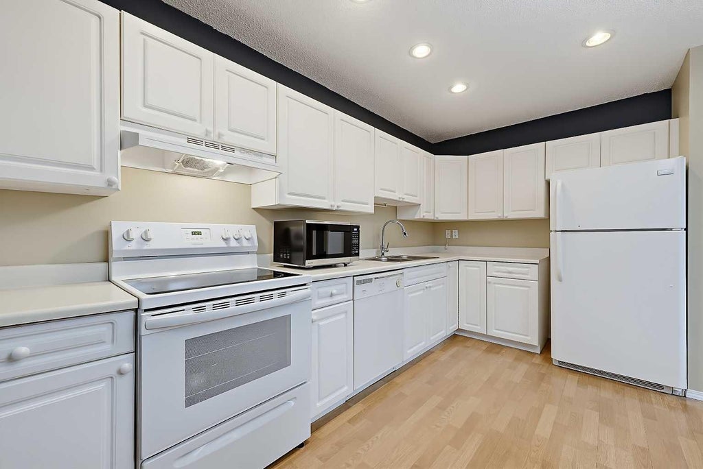 Photo of 3620 51 Street SW #15, Calgary, AB T3E 6N7 (MLS # A2338465)