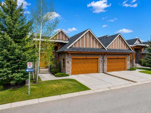 Photo of 63 Cortina Villas SW, Calgary, AB T3H 0W8 (MLS # A2336290)