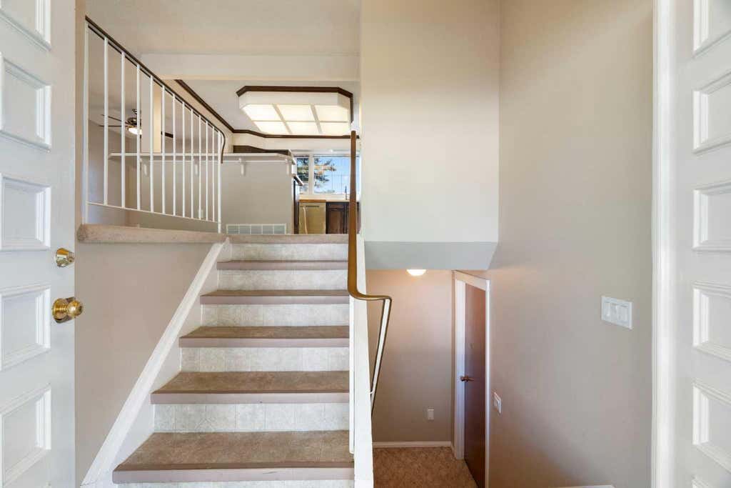 Photo of 427 Queensland Road SE, Calgary, AB T2J 3S5 (MLS # A2321841)