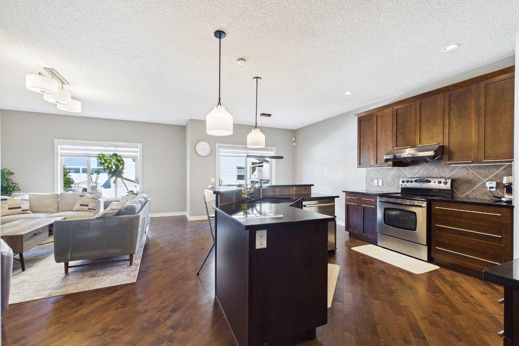 Photo of 163 Panamount Circle NW, Calgary, AB T3K 0G9 (MLS # A2341809)
