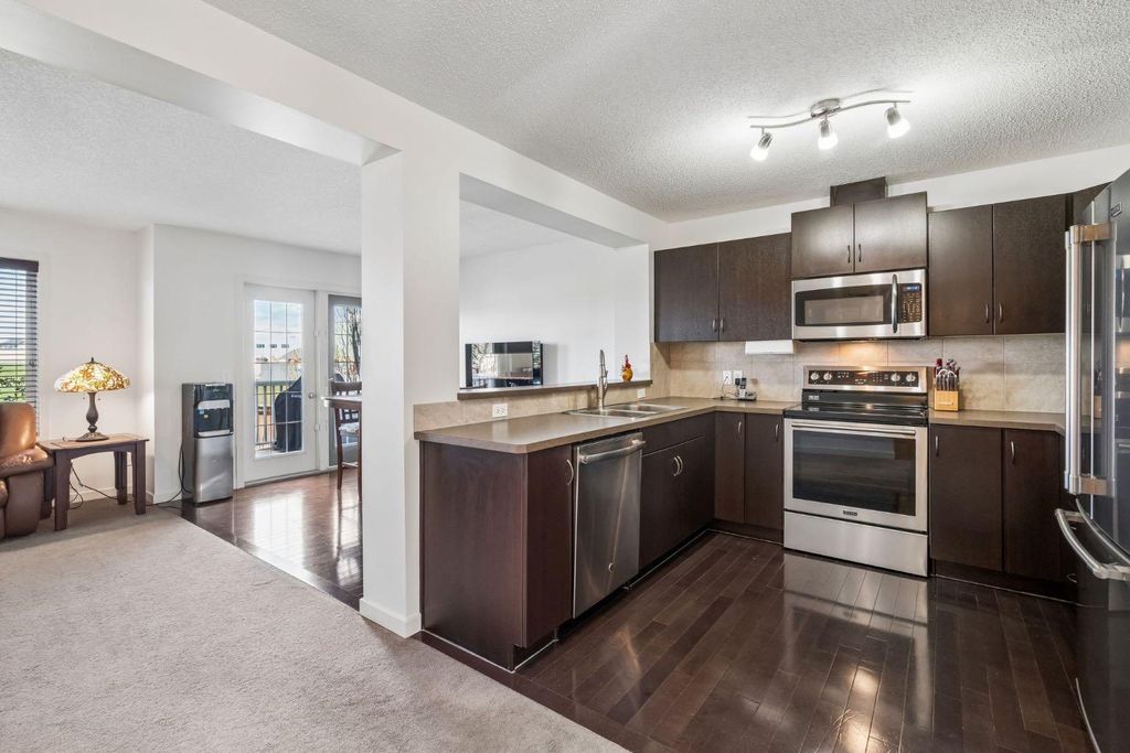 Photo of 150 River Heights Crescent, Cochrane, AB T4C 0J5 (MLS # A2308392)
