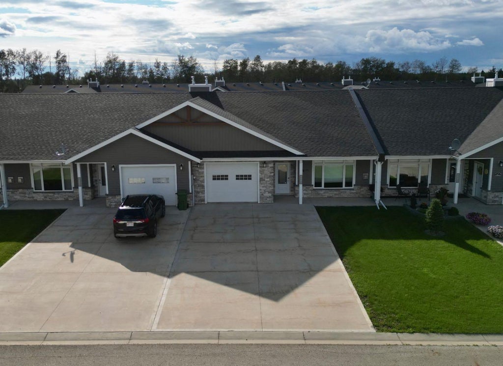 Photo of 9904 111 Street Unit 4, La Crete, AB T0H 2H0 (MLS # A2336751)