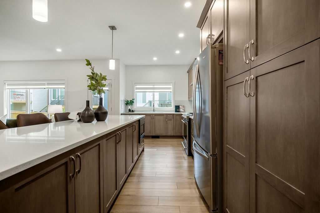 Photo of 882 Bluerock Way SW, Calgary, AB T2Y 0S5 (MLS # A2336826)