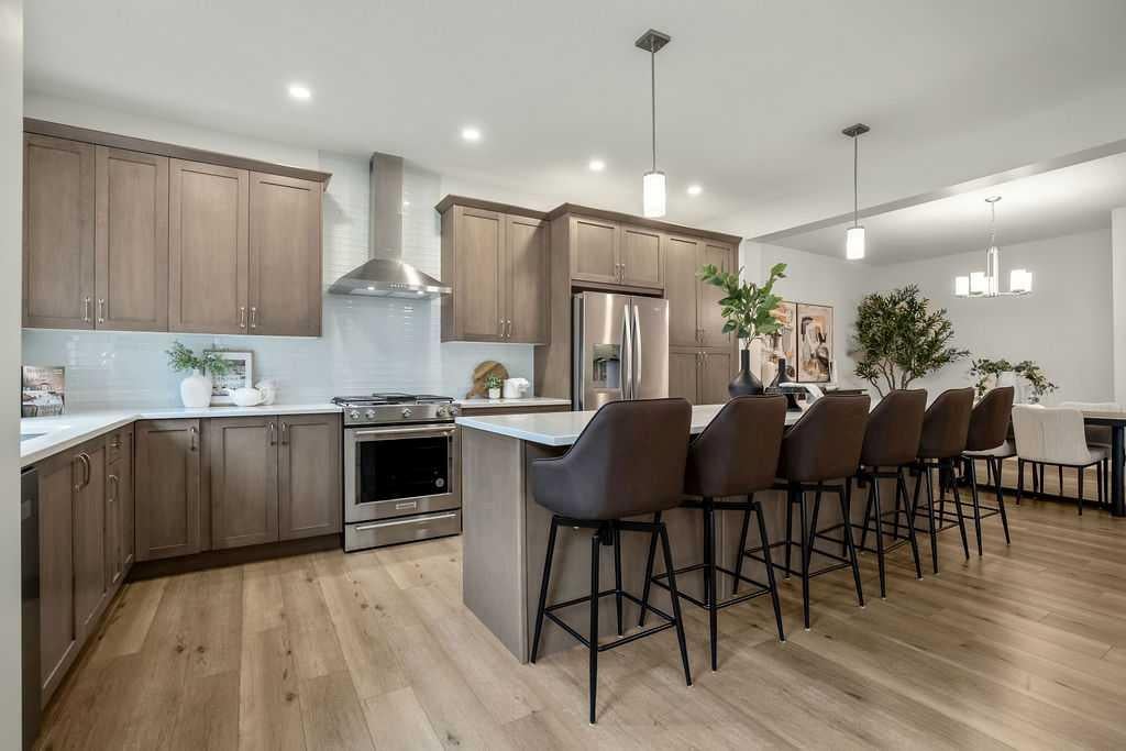 Photo of 882 Bluerock Way SW, Calgary, AB T2Y 0S5 (MLS # A2336826)