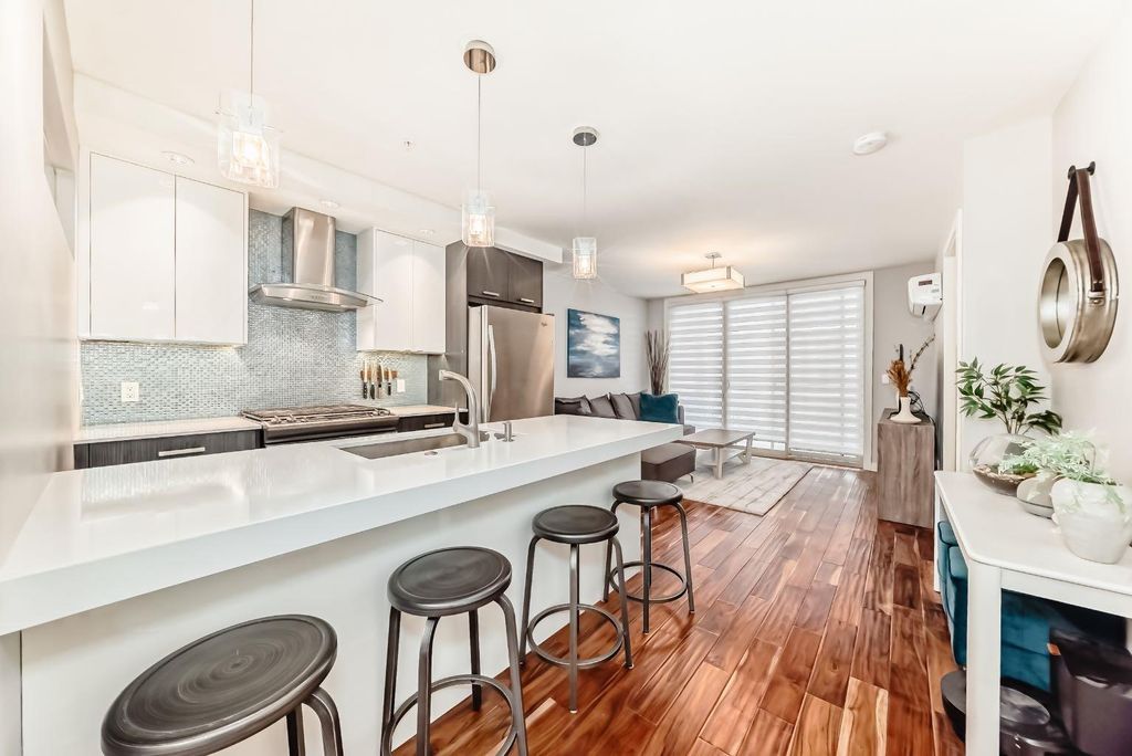 Photo of 1029 15 Avenue SW #303, Calgary, AB T2R 0S5 (MLS # A2293605)