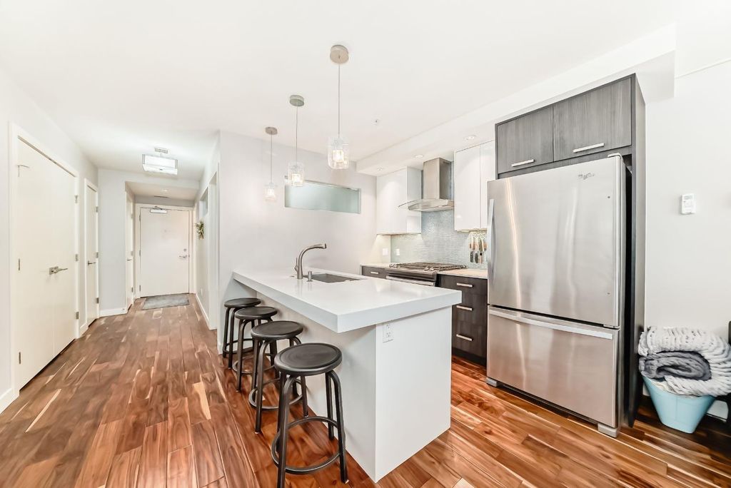 Photo of 1029 15 Avenue SW #303, Calgary, AB T2R 0S5 (MLS # A2293605)
