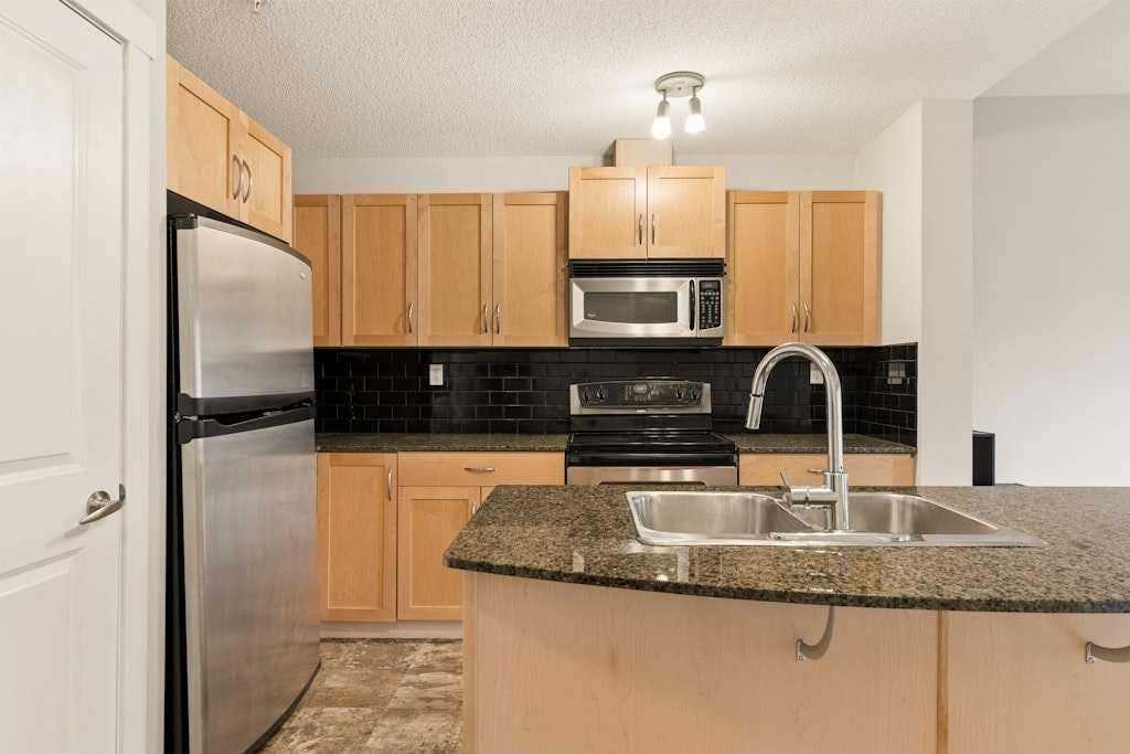 Photo of 5605 Henwood Street SW #3412, Calgary, AB T3E 7R2 (MLS # A2335550)
