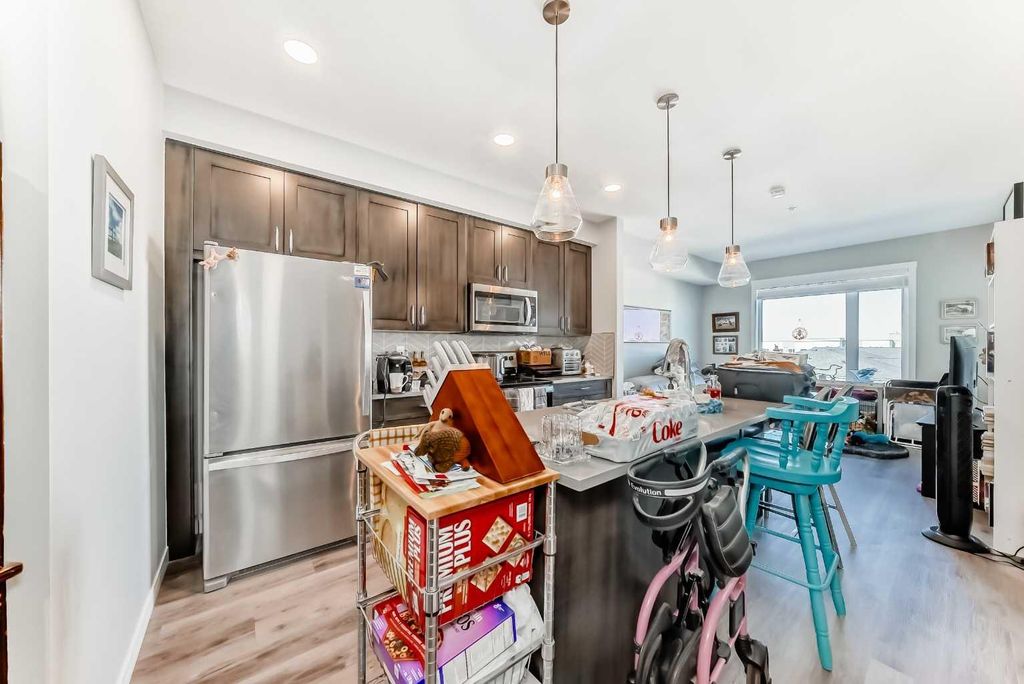 Photo of 200 Shawnee Square SW #403, Calgary, AB T2Y 0T7 (MLS # A2264900)