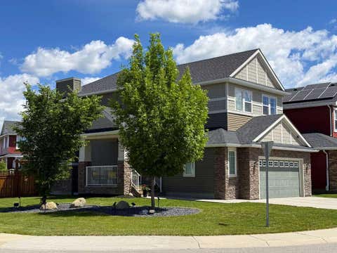 Photo of 100 Kinniburgh Gardens, Chestermere, AB T1X 0R8 (MLS # A2302807)