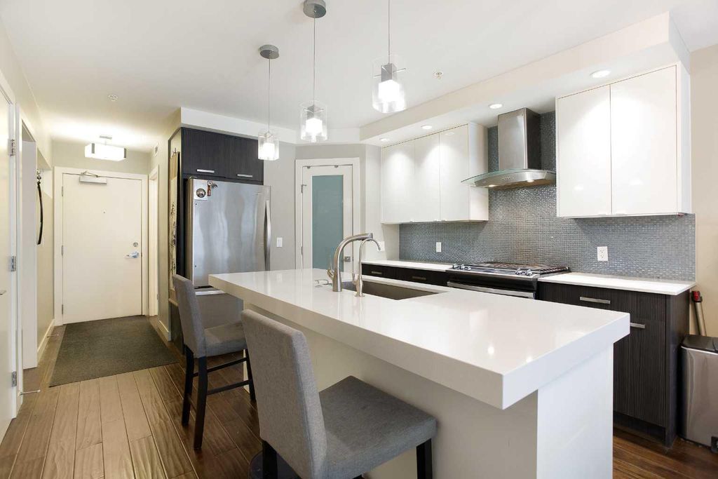 Photo of 1029 15 Avenue SW #202, Calgary, AB T2R 0S5 (MLS # A2296248)