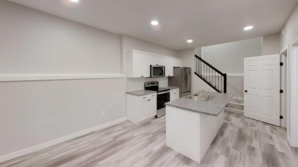 Photo of 10526 131 Avenue #A, Grande Prairie, AB T8V 6V2 (MLS # A2341497)