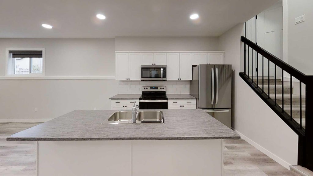 Photo of 10526 131 Avenue #A, Grande Prairie, AB T8V 6V2 (MLS # A2341497)