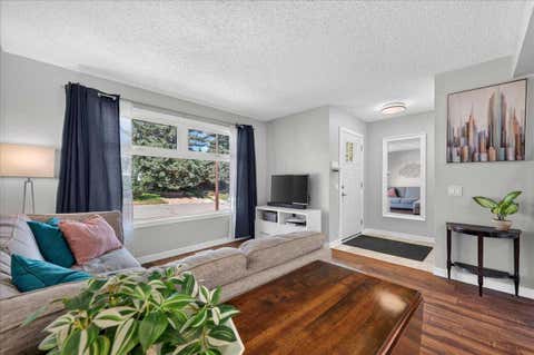 Photo of 39 Midridge Gardens SE, Calgary, AB T2X 1C4 (MLS # A2333974)