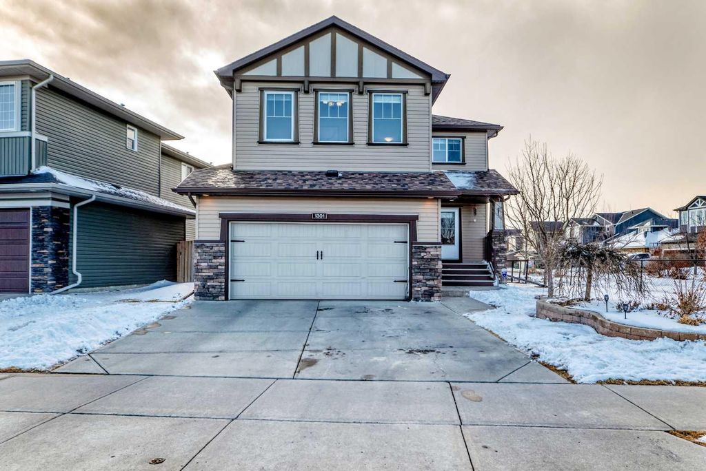 Photo of 1301 Ravenswood Drive SE, Airdrie, AB T4A 0J4 (MLS # A2292085)