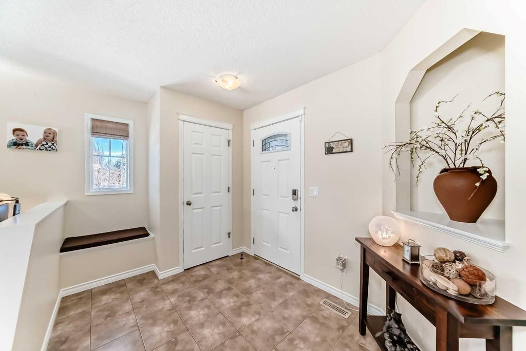 Photo of 1301 Ravenswood Drive SE, Airdrie, AB T4A 0J4 (MLS # A2292085)