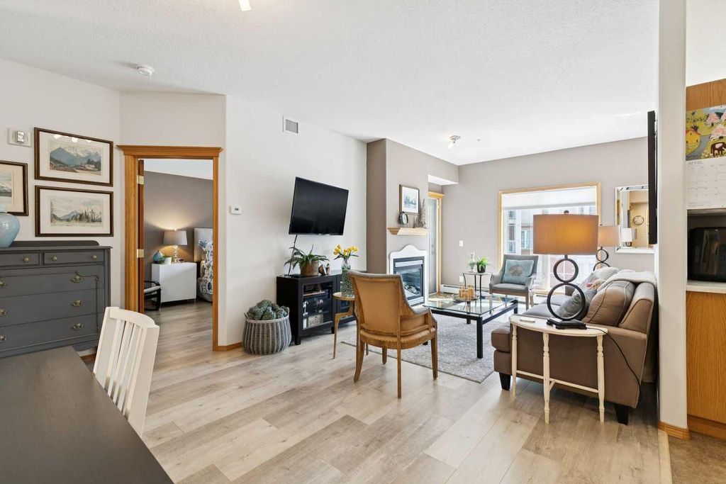 Photo of 223 Tuscany Springs Boulevard NW #221, Calgary, AB T3L 2M2 (MLS # A2300843)