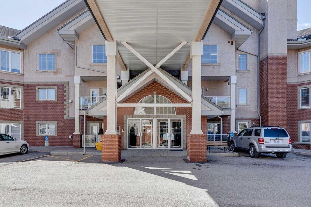 Photo of 223 Tuscany Springs Boulevard NW #221, Calgary, AB T3L 2M2 (MLS # A2300843)