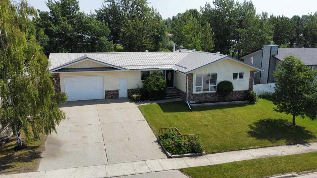 Photo of 10625 105 Avenue, Grande Cache, AB T0E 0Y0 (MLS # A2332670)