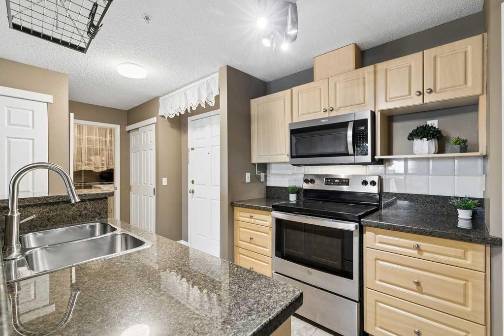 Photo of 290 Shawville Way SE #307, Calgary, AB T2Y 3Z9 (MLS # A2346769)